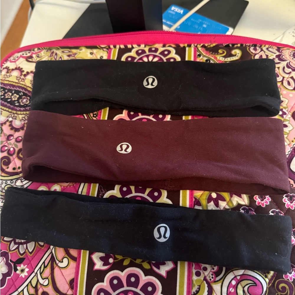 3 lululemon headbands -2 black and 1 maroon